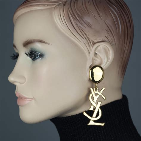 ysl earrings samantha jones|Vintage YVES SAINT LAURENT Ysl Iconic Logo Drop Earrings.